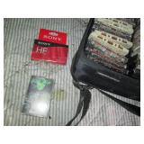 Softside case of music cassette tap...