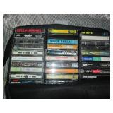 Softside case of music cassette tap...