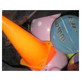 Garbage bag with assorted sporting ...