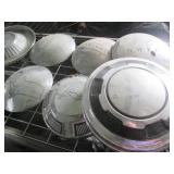 Vintage hubcaps from a variety of a...