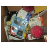 Large box containing spray paints, ...