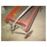 Antique wooden wagon with metal han...