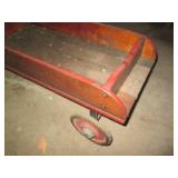 Antique wooden wagon with metal han...