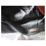 Large trash containing a variety of...