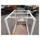 (2) rolling carts: Orange Rubbermaid commercial and Rubbermaid service cart with metal stand on top