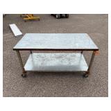 Metal rolling work table 60 ½” l x 30” w x 32 ½”