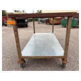 Metal rolling work table 60 ½” l x 30” w x 32 ½”
