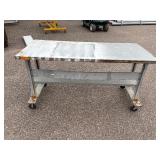 Metal rolling work table 72 ¼” l x 30” w x 38 ½” t