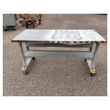 Metal rolling work table 72 ¼” l x 30” w x 38 ½” t