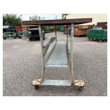 Metal rolling work table 72 ¼” l x 30” w x 38 ½” t