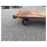 Flat industrial metal dolly 60” l x 30 ¼” w x 11”t