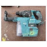 (2) Makita Concrete Hammer Drills XRH01, (4) batteries, (2) DC18RC Lithium chargers (2) DX01 Dust Extractor