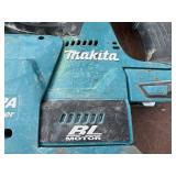 (2) Makita Concrete Hammer Drills XRH01, (4) batteries, (2) DC18RC Lithium chargers (2) DX01 Dust Extractor