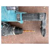 (2) Makita Concrete Hammer Drills XRH01, (4) batteries, (2) DC18RC Lithium chargers (2) DX01 Dust Extractor