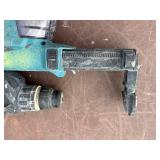 (2) Makita Concrete Hammer Drills XRH01, (4) batteries, (2) DC18RC Lithium chargers (2) DX01 Dust Extractor