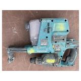 (2) Makita Concrete Hammer Drills XRH01, (4) batteries, (2) DC18RC Lithium chargers (2) DX01 Dust Extractor