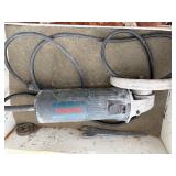 (2) Bosch corded angle grinders in carrying case. Powers up.