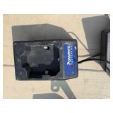 2 Powers Trak-It Gas Fastening tool in cases; battery in one case has a charge. Both fasteners power up