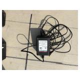 2 Powers Trak-It Gas Fastening tool in cases; battery in one case has a charge. Both fasteners power up