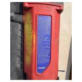 2 Powers Trak-It Gas Fastening tool in cases; battery in one case has a charge. Both fasteners power up