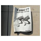 2 Powers Trak-It Gas Fastening tool in cases; battery in one case has a charge. Both fasteners power up