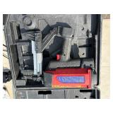 2 Powers Trak-It Gas Fastening tool in cases; battery in one case has a charge. Both fasteners power up