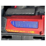 2 Powers Trak-It Gas Fastening tool in cases; battery in one case has a charge. Both fasteners power up