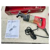 (2) Milwaukee Heavy-Duty Sawzall in case. Both power up