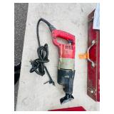 (2) Milwaukee Heavy-Duty Sawzall in case. Both power up