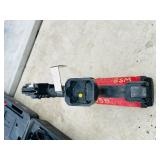 (2) Powers Trak-It C3 Gas Fastening tool in cases; Battery and charger Both power up