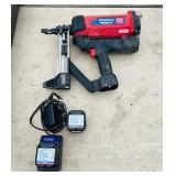 (2) Powers Trak-It C3 Gas Fastening tool in cases; Battery and charger Both power up