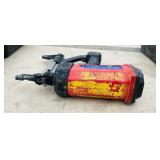 (2) Powers Trak-It C3 Gas Fastening tool in cases; Battery and charger Both power up