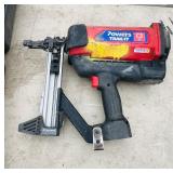 (2) Powers Trak-It C3 Gas Fastening tool in cases; Battery and charger Both power up