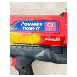 (2) Powers Trak-It C3 Gas Fastening tool in cases; Battery and charger Both power up