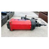 (2) Powers Trak-It C3 Gas Fastening tool in cases; Battery and charger Both power up