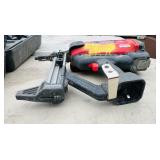 (2) Powers Trak-It C3 Gas Fastening tool in cases; Battery and charger Both power up