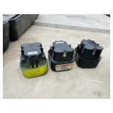 (2) Powers Trak-It C3 Gas Fastening tool in cases; Battery and charger Both power up