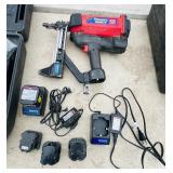 (2) Powers Trak-It C3 Gas Fastening tool in cases; Battery and charger Both power up