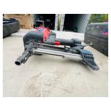 (2) Powers Trak-It C3 Gas Fastening tool in cases; Battery and charger Both power up