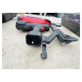 (2) Powers Trak-It C3 Gas Fastening tool in cases; Battery and charger Both power up