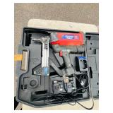 (2) Powers Trak-it Power Fasteners C3 ST Nail Guns with batteries and chargers Both power up