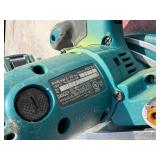 (2) Makita XSC01 handheld circular saws with 2 18V 3.0 AH batteries & a DC18RA charger.