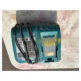 (2) Makita XSC01 handheld circular saws with 2 18V 3.0 AH batteries & a DC18RA charger.