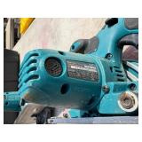 (2) Makita XSC01 handheld circular saws with (1) 18V 3.0 AH and (1) 4.0 AH batteries & a DC18RA charger