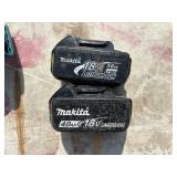 (2) Makita XSC01 handheld circular saws with (1) 18V 3.0 AH and (1) 4.0 AH batteries & a DC18RA charger