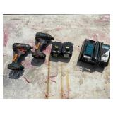 (2) Makita impact drivers with (2) 18V batteries & a DC18RC charger