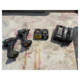 (2) Makita impact drivers with (2) 18V batteries & a DC18RC charger