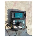 (2) Makita impact drivers with (2) 18V 3.0AH batteries & a DC18RC charger