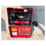 Hilti DX600N concrete nail gun with safety boosters, concrete nails and anchors, in a case