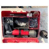 Hilti DX600N concrete nail gun with safety boosters, concrete nails and anchors, in a case